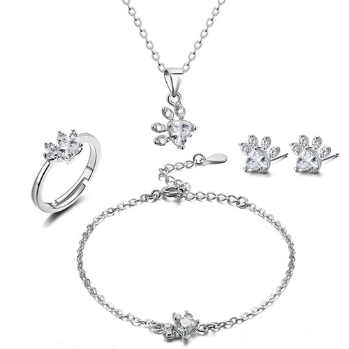 Rose gold jewelry set with paw motif