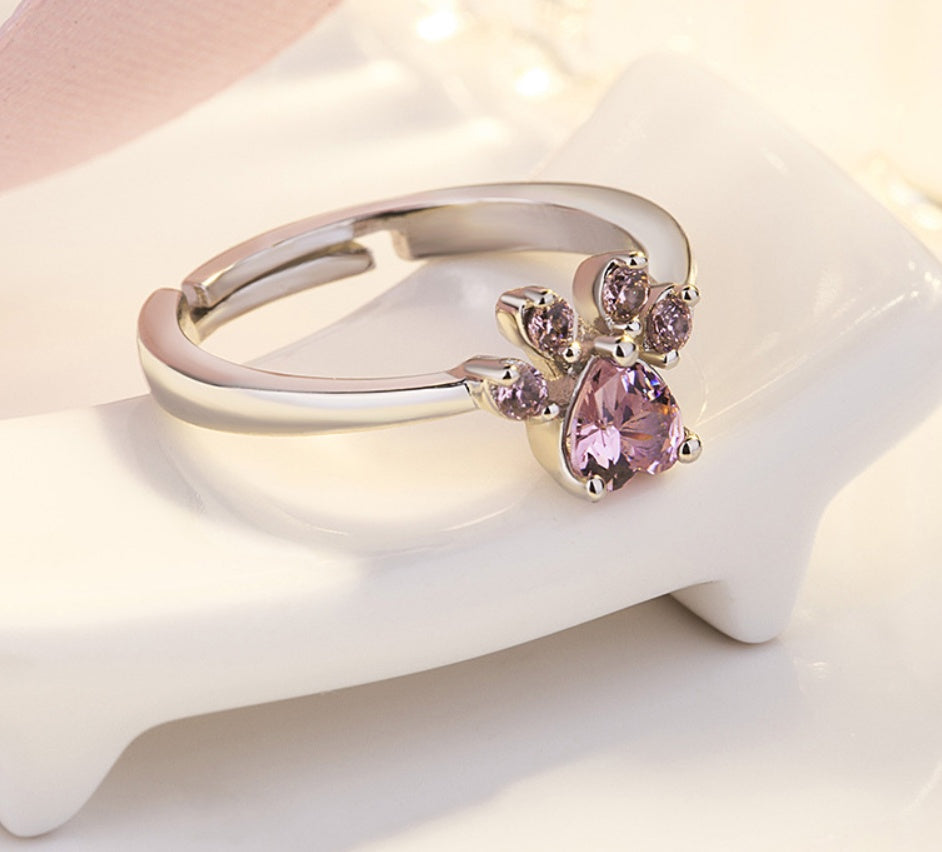 Rose gold jewelry set with paw motif