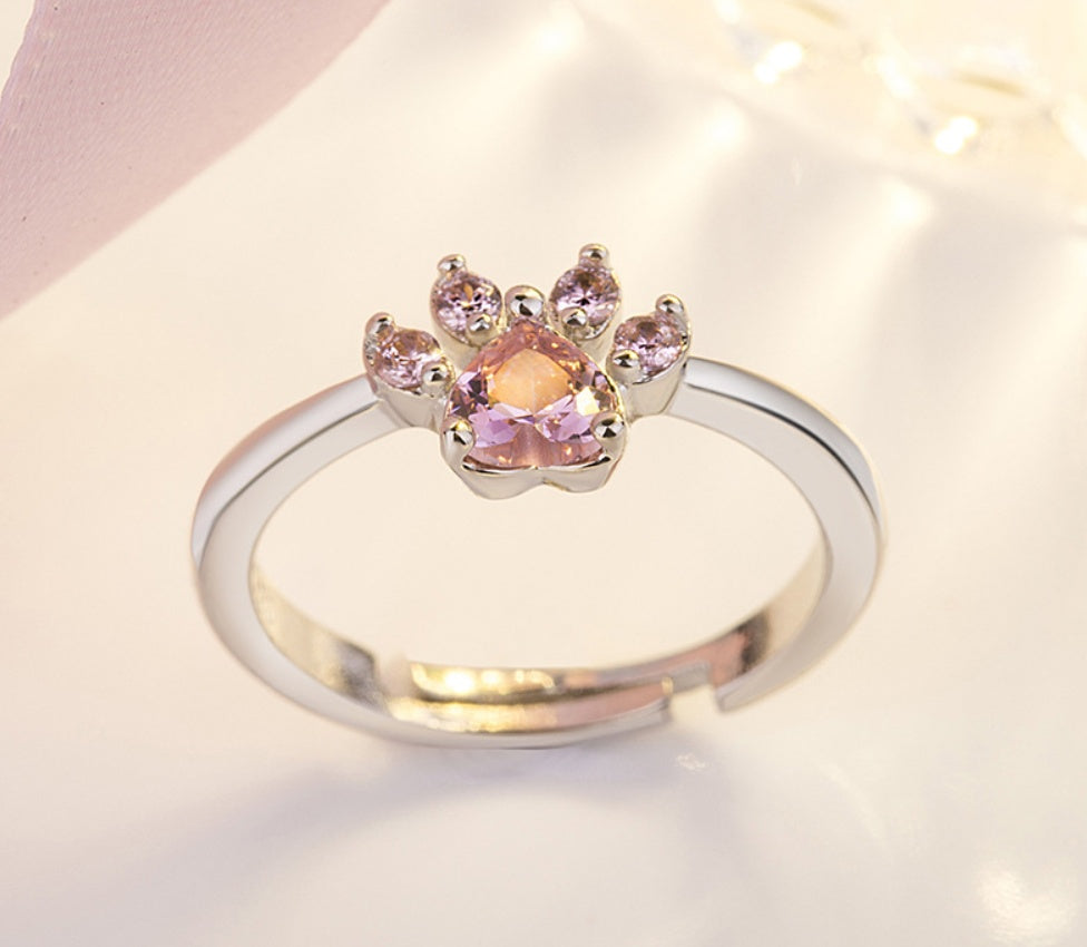 Rose gold jewelry set with paw motif
