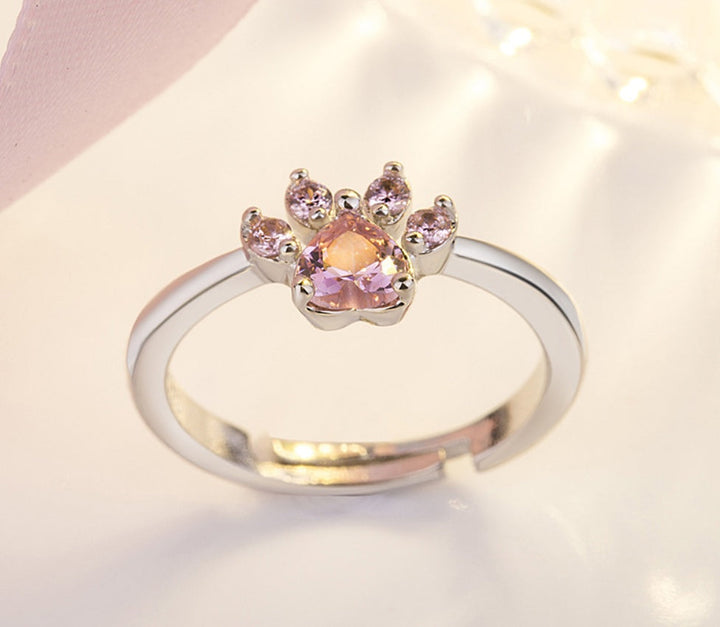 Rose gold jewelry set with paw motif