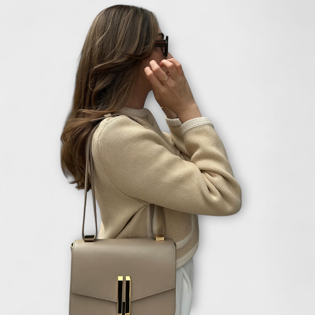 Classic sweater with decorative pockets