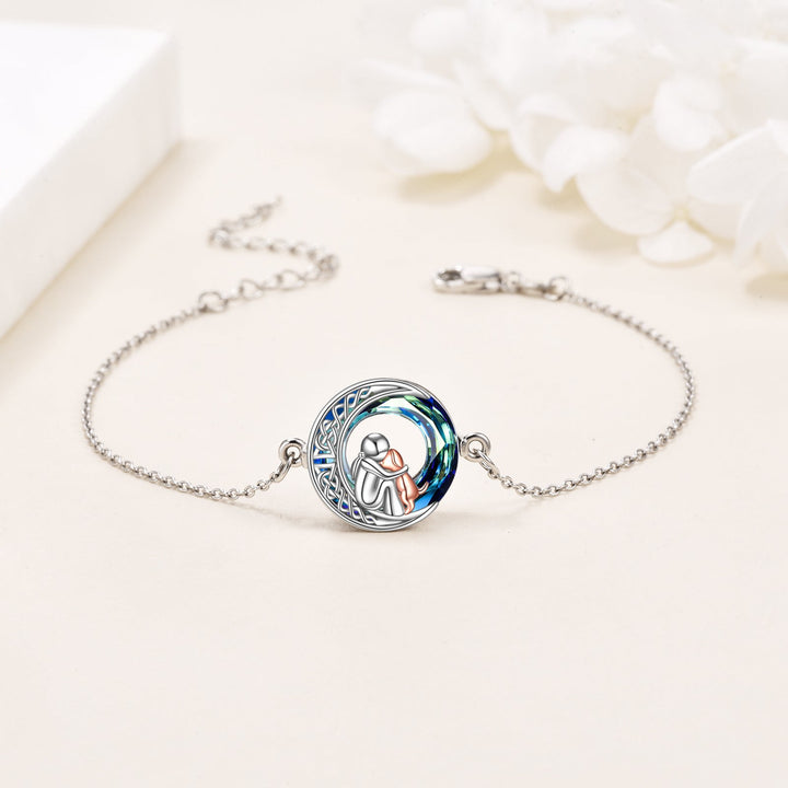 Adjustable bracelet with a dog-shaped charm made of sterling silver