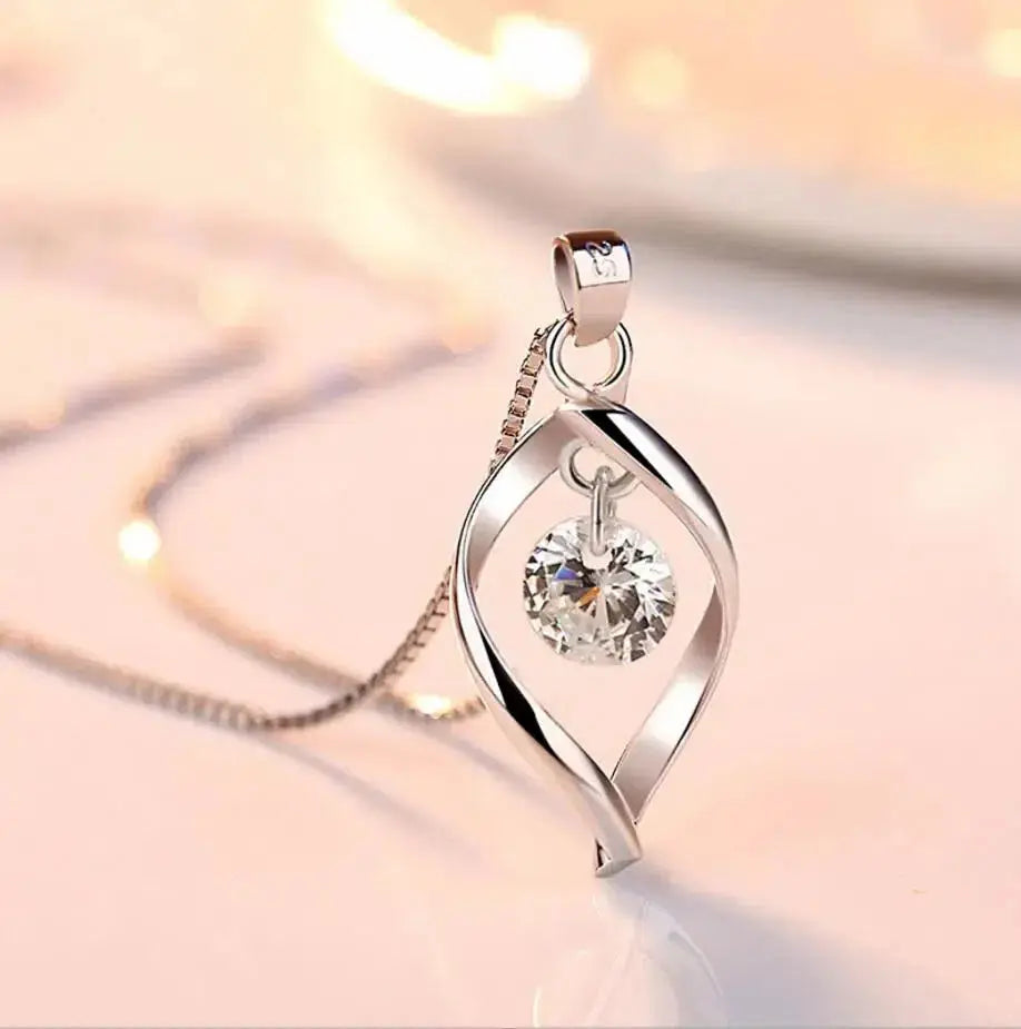 Silver necklace with a twisted drop-shaped pendant