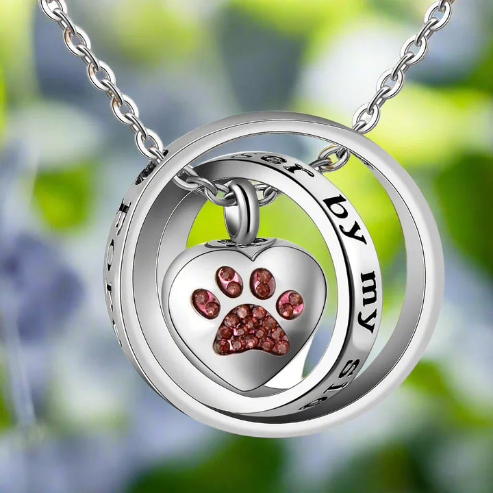 Necklace with stainless steel urn in the shape of a paw