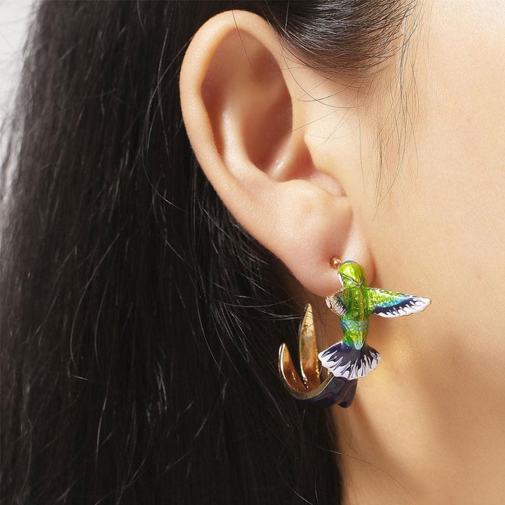 Unique creative earrings in the shape of a hummingbird