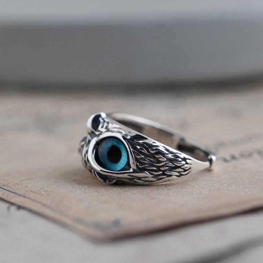Adjustable owl of luck ring made of silver and opal