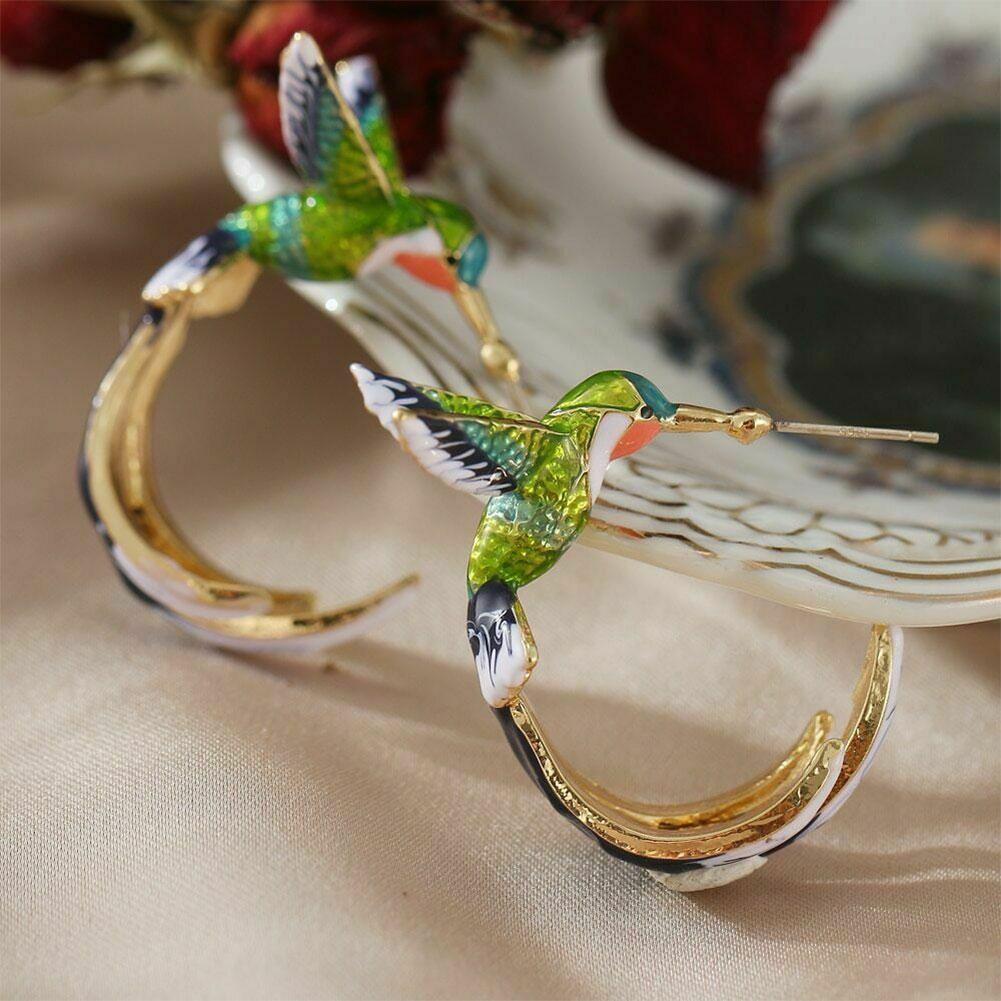 Unique creative earrings in the shape of a hummingbird