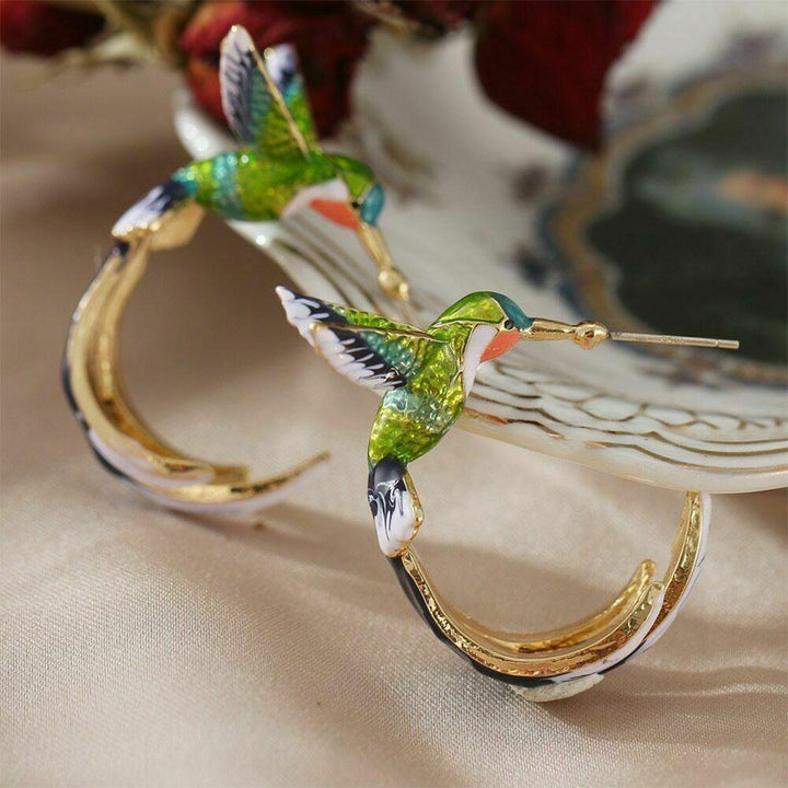 Unique creative earrings in the shape of a hummingbird