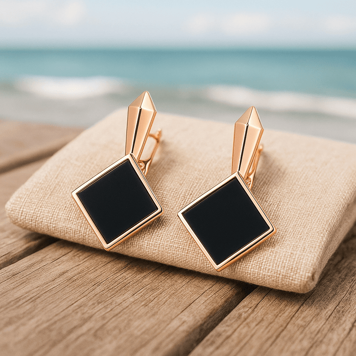 Ear beads with square black gemstones