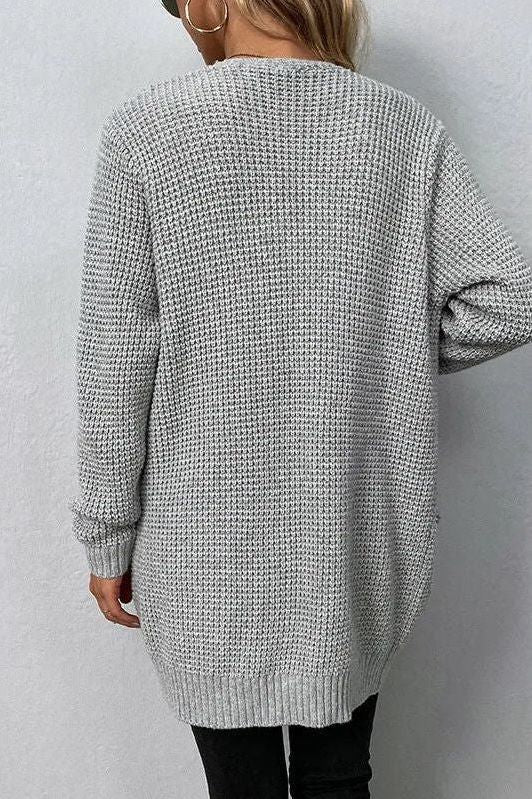 Pink cardigan with an open front