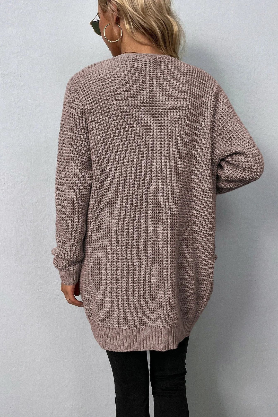 Pink cardigan with an open front