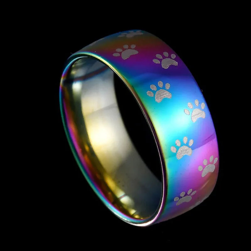 Handmade ring with a rainbow-colored steel paw print