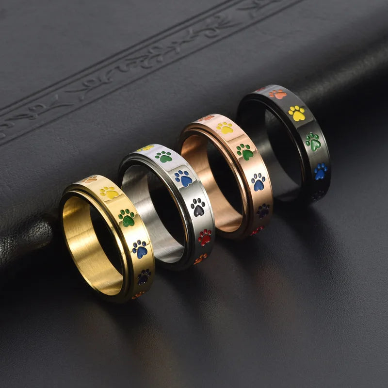 Rotating stress relief ring for paws