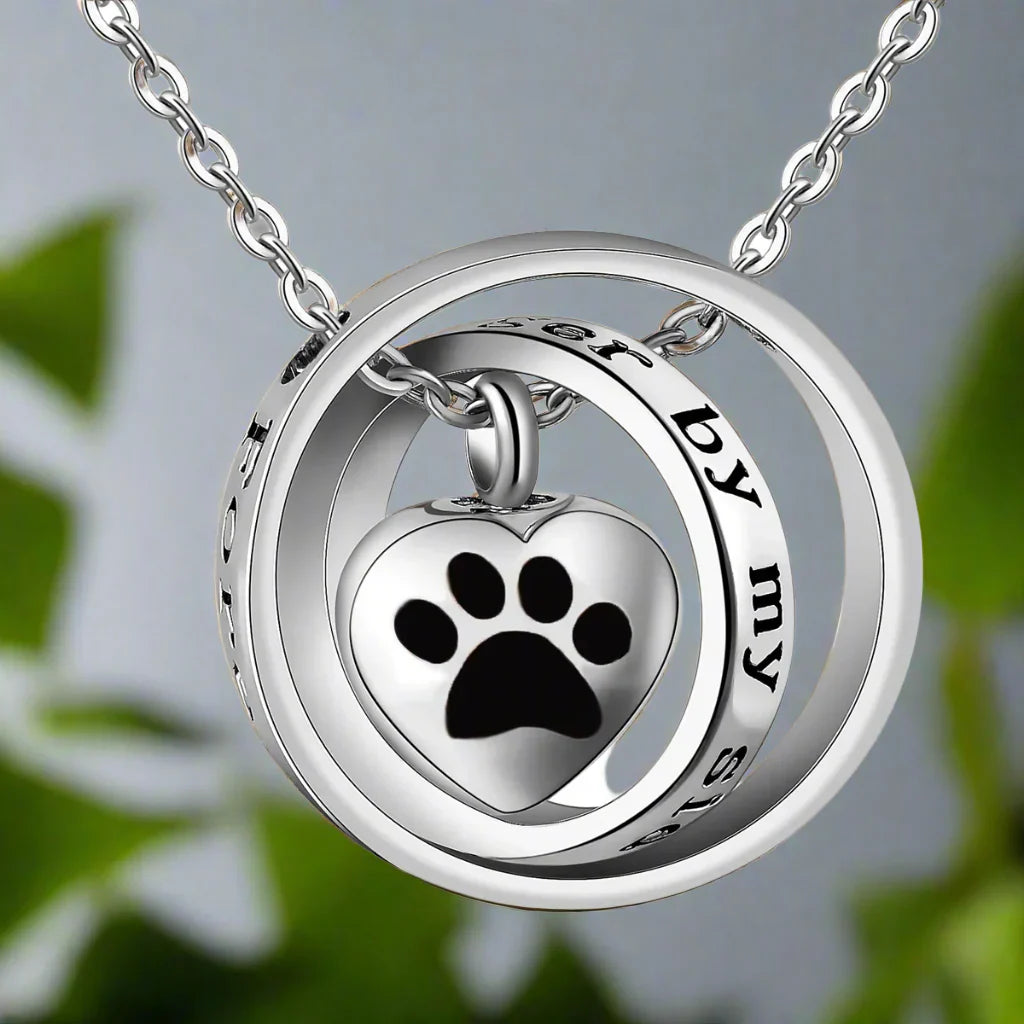Necklace with stainless steel urn in the shape of a paw