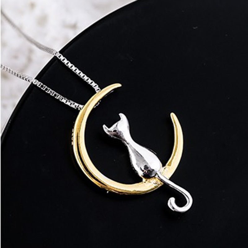 Elegant necklace with a crescent moon and a cat