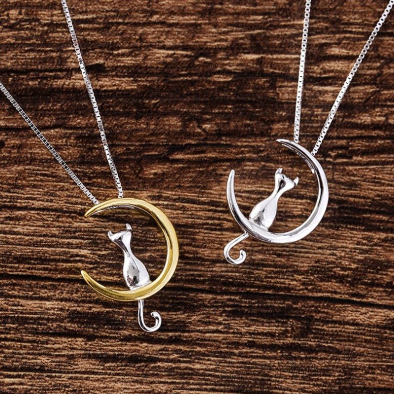 Elegant necklace with a crescent moon and a cat