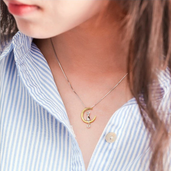 Elegant necklace with a crescent moon and a cat