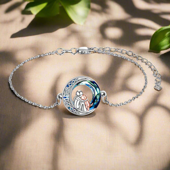 Adjustable bracelet with a dog-shaped charm made of sterling silver