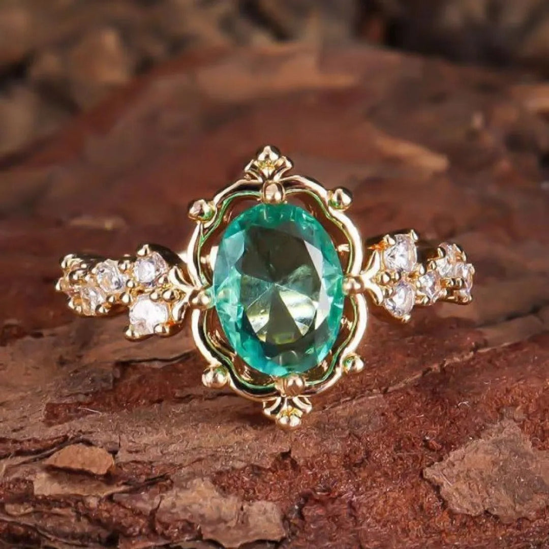 Smaragdwind – gold ring with green agate and leaf motif