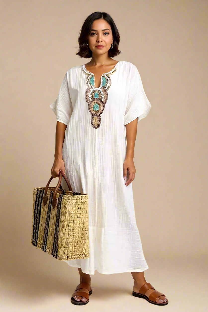 SAGA DRESS | Long dress with decorated neckline and side slits