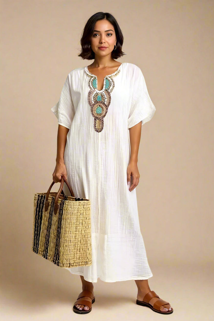 SAGA DRESS | Long dress with decorated neckline and side slits