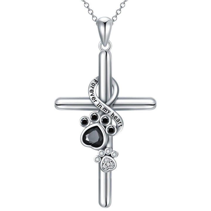 Silver paw and cross pendant necklace